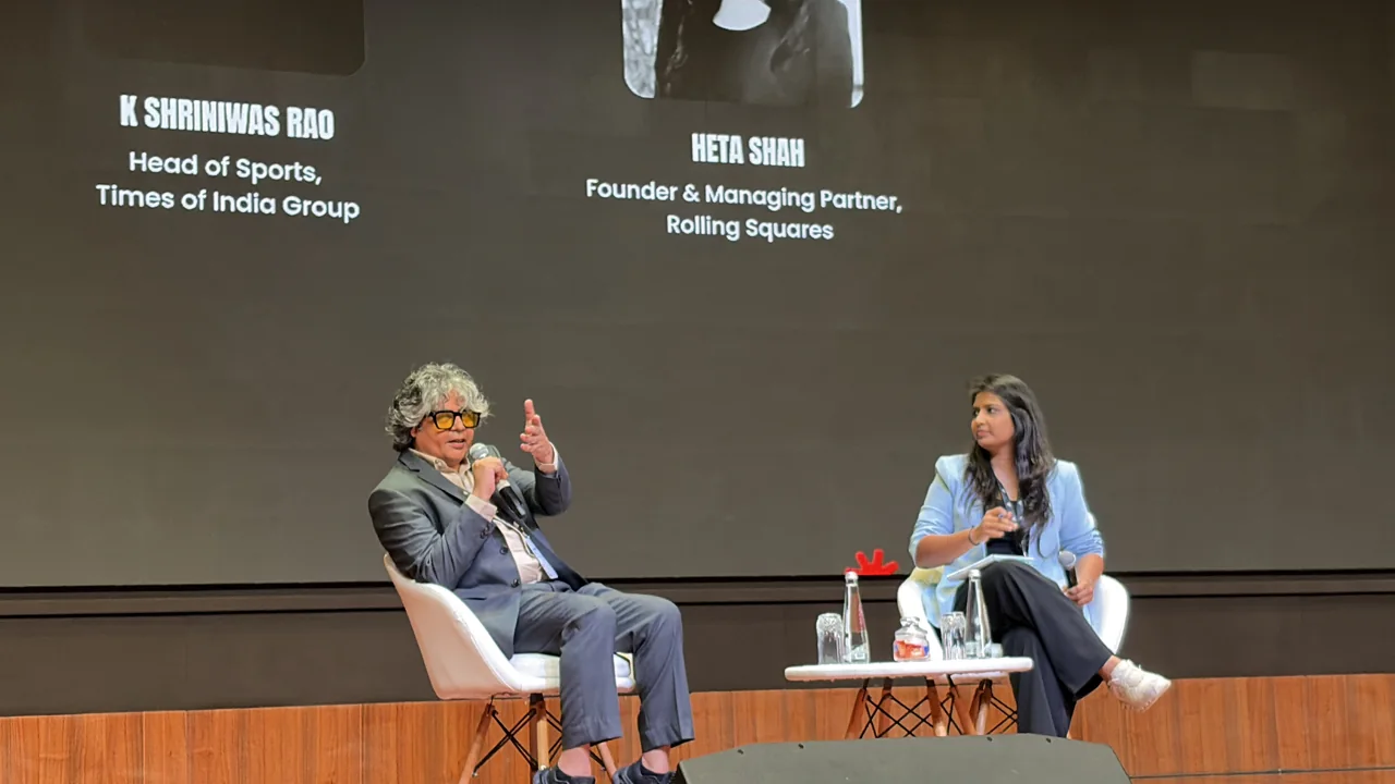 Heta Shah moderating the sports media rights conversation with K. Shriniwas Rao at IAMGAME